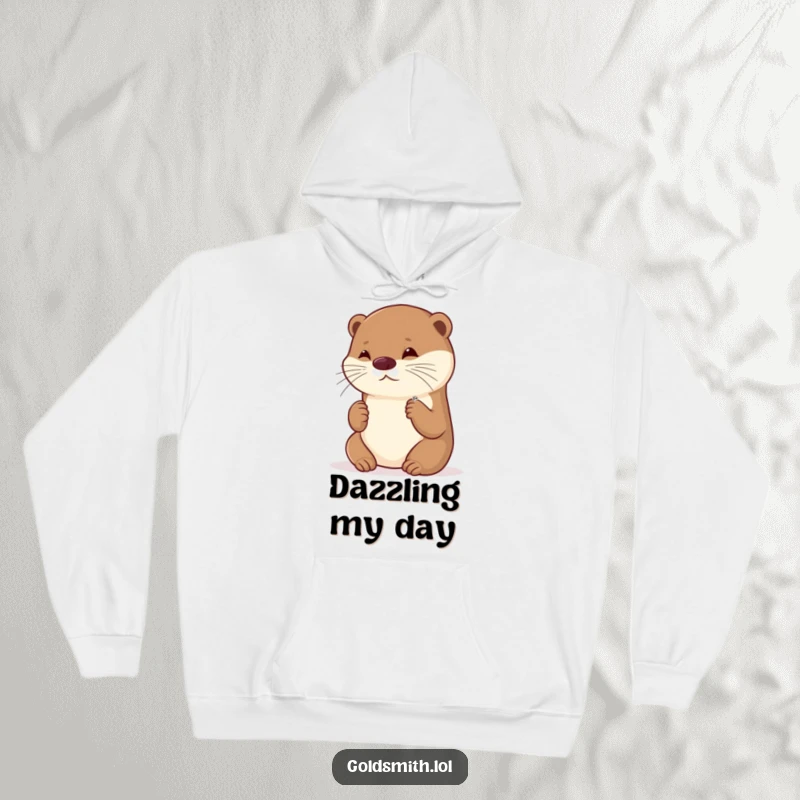 Funny hoodie showing a playful otter admiring a tiny, sparkling brooch, exuding charm and a love for beautiful accessories.